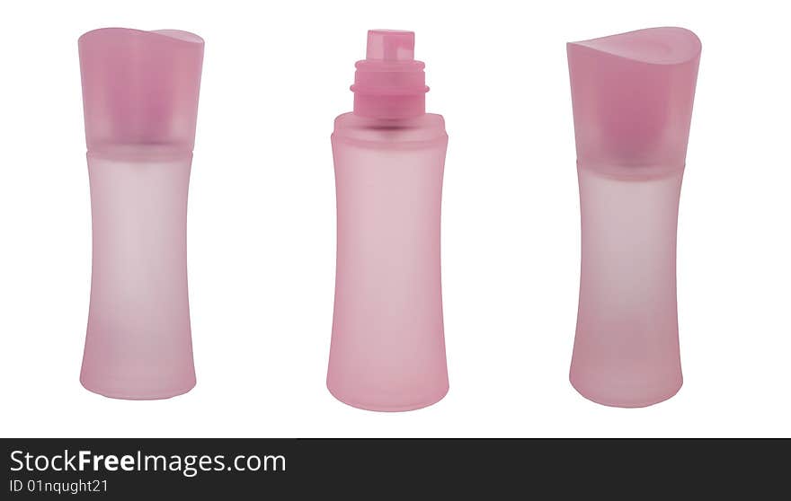 Isolated pink bottle of perfume