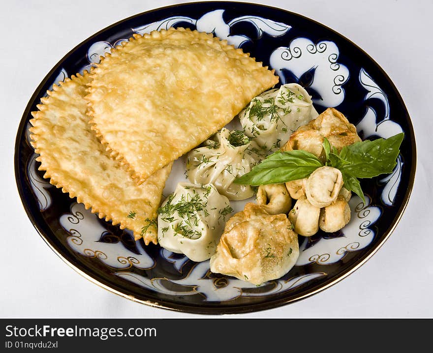 Meat dumplings and meat in a test to fry