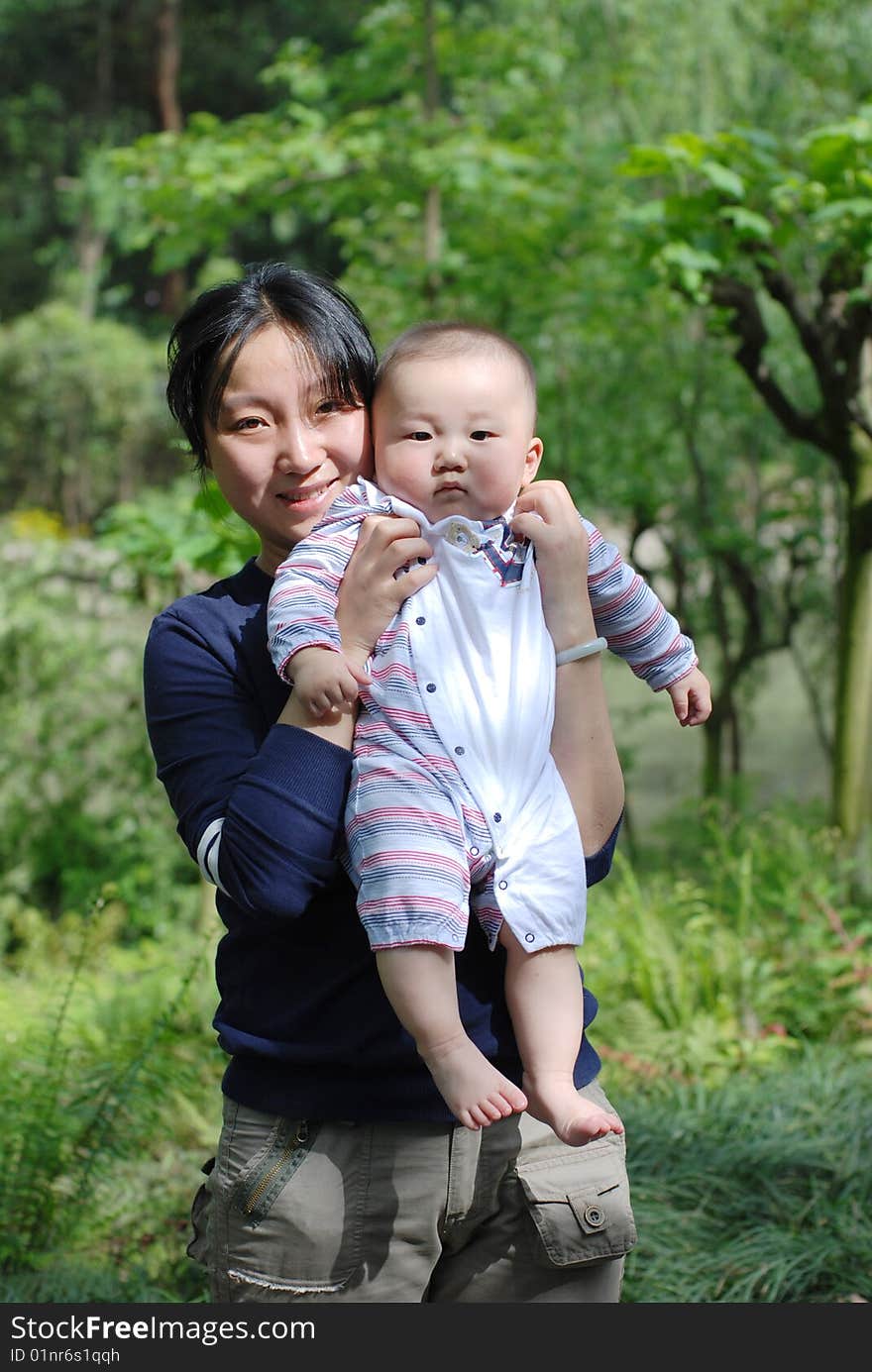 Cute baby  with  mother