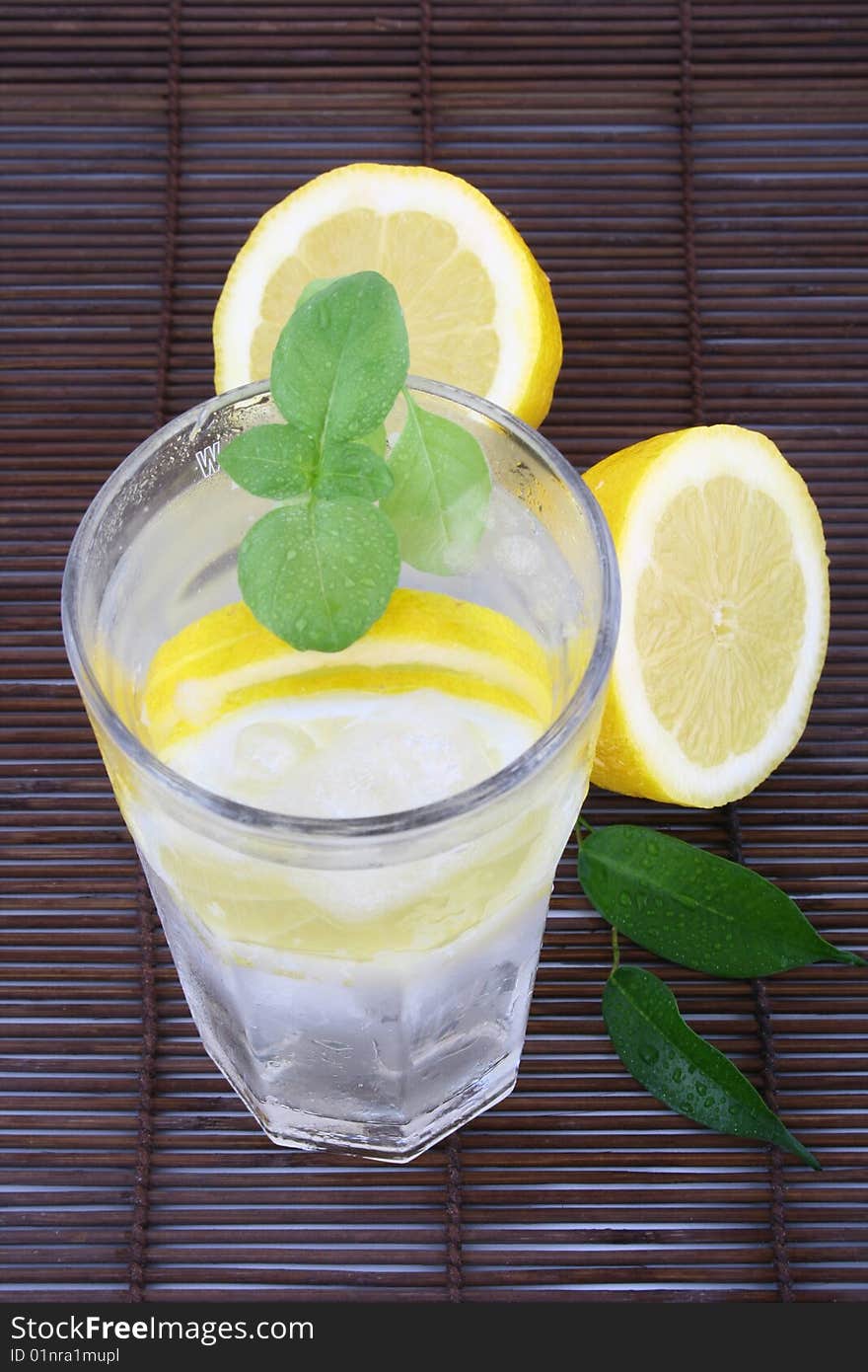 Glass of clean fresh water with lemon