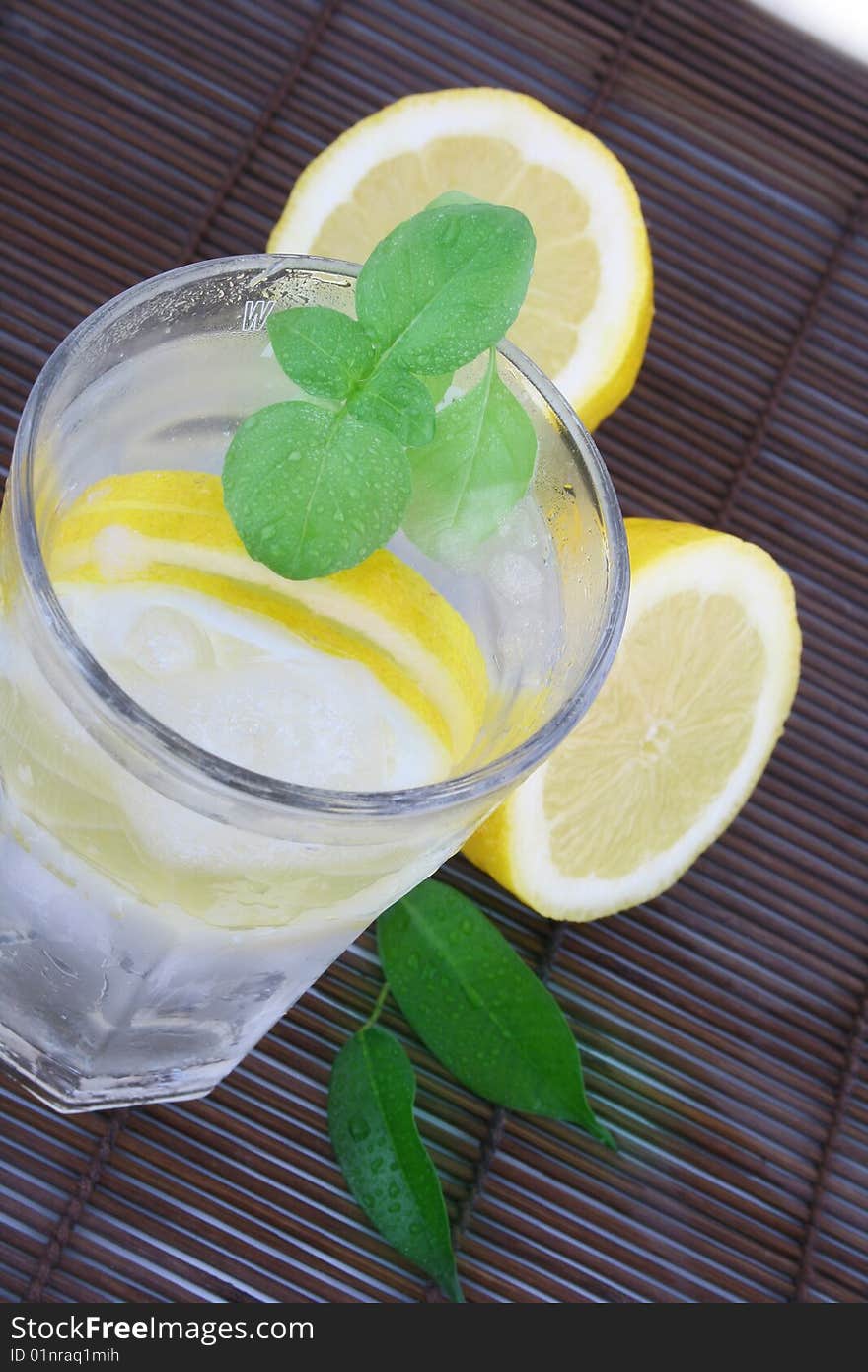 Glass of clean fresh water with lemon