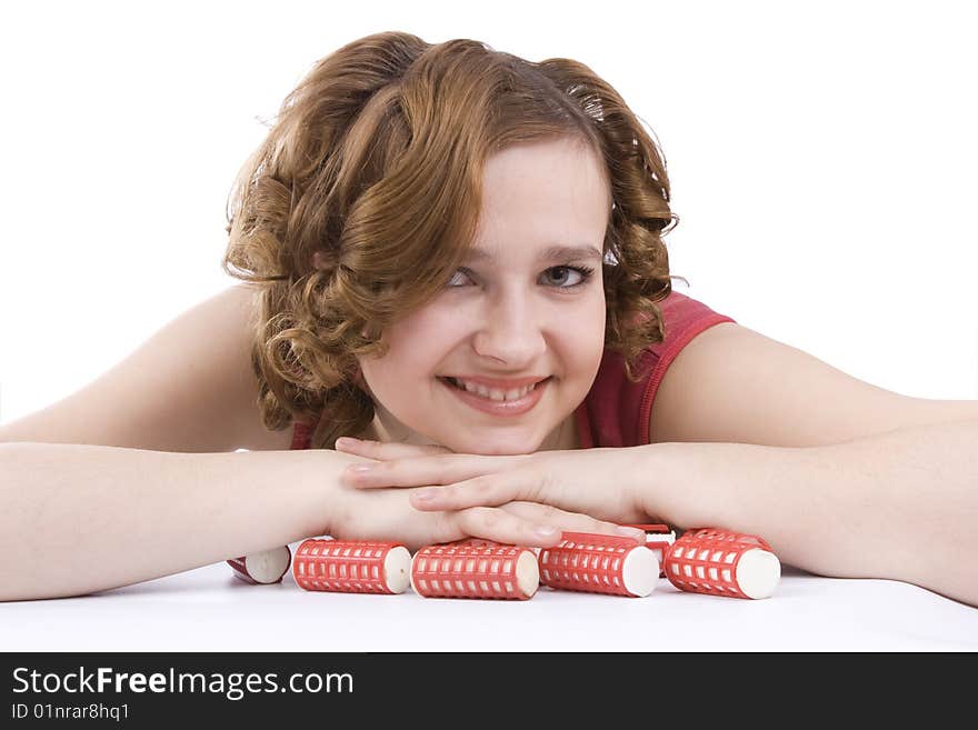 Woman with curlers in her hair.