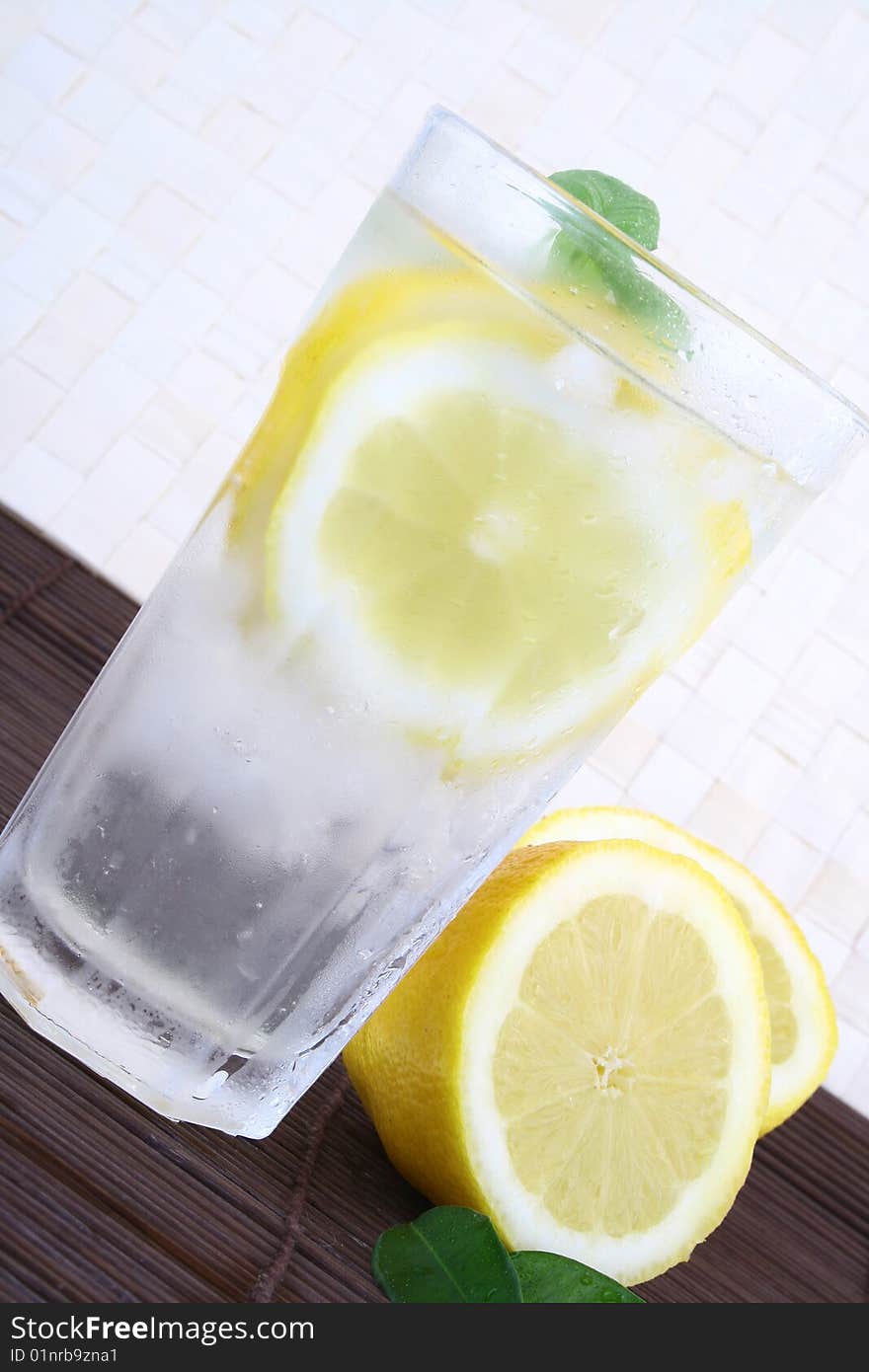 Glass of clean fresh water with lemon