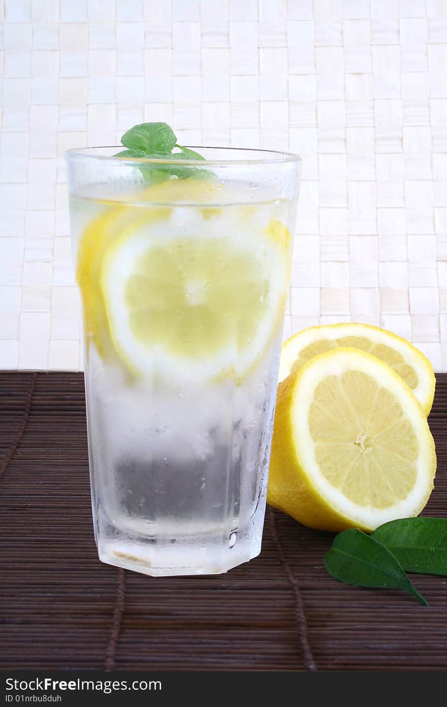 Glass of clean fresh water with lemon