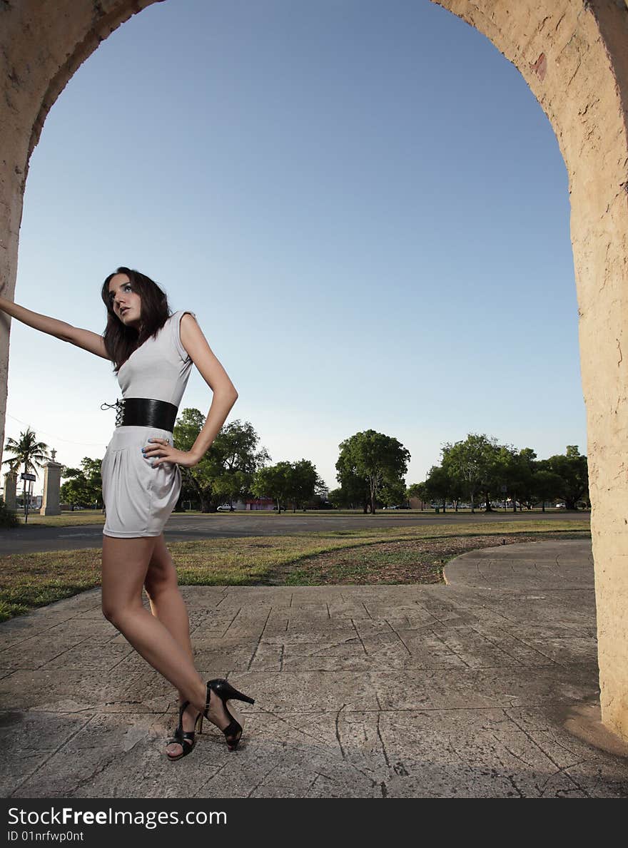 Woman by an arch