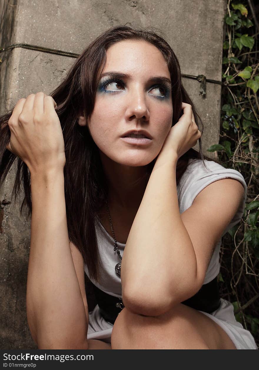 Young woman with a displeased facial expression. Young woman with a displeased facial expression