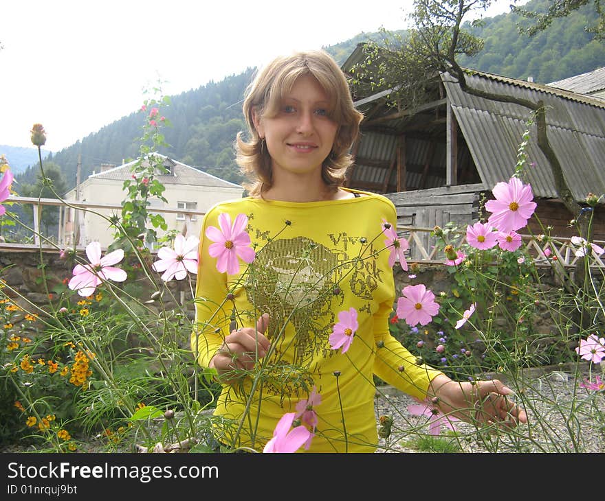 Beautiful girl with colors mud flow