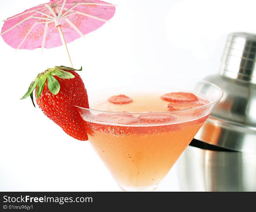 Strawberry coctail with fruit and shaker on a white background. Strawberry coctail with fruit and shaker on a white background