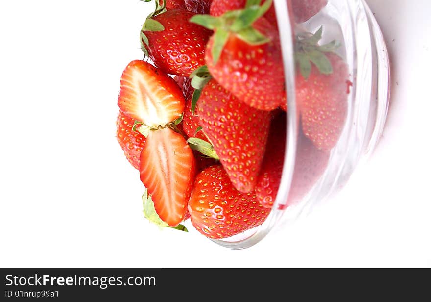 Bowl full of strawberries on a white background. Bowl full of strawberries on a white background