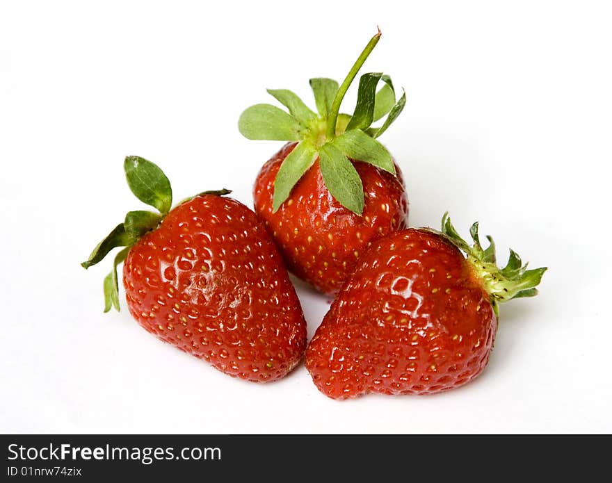 Strawberries isolated over white