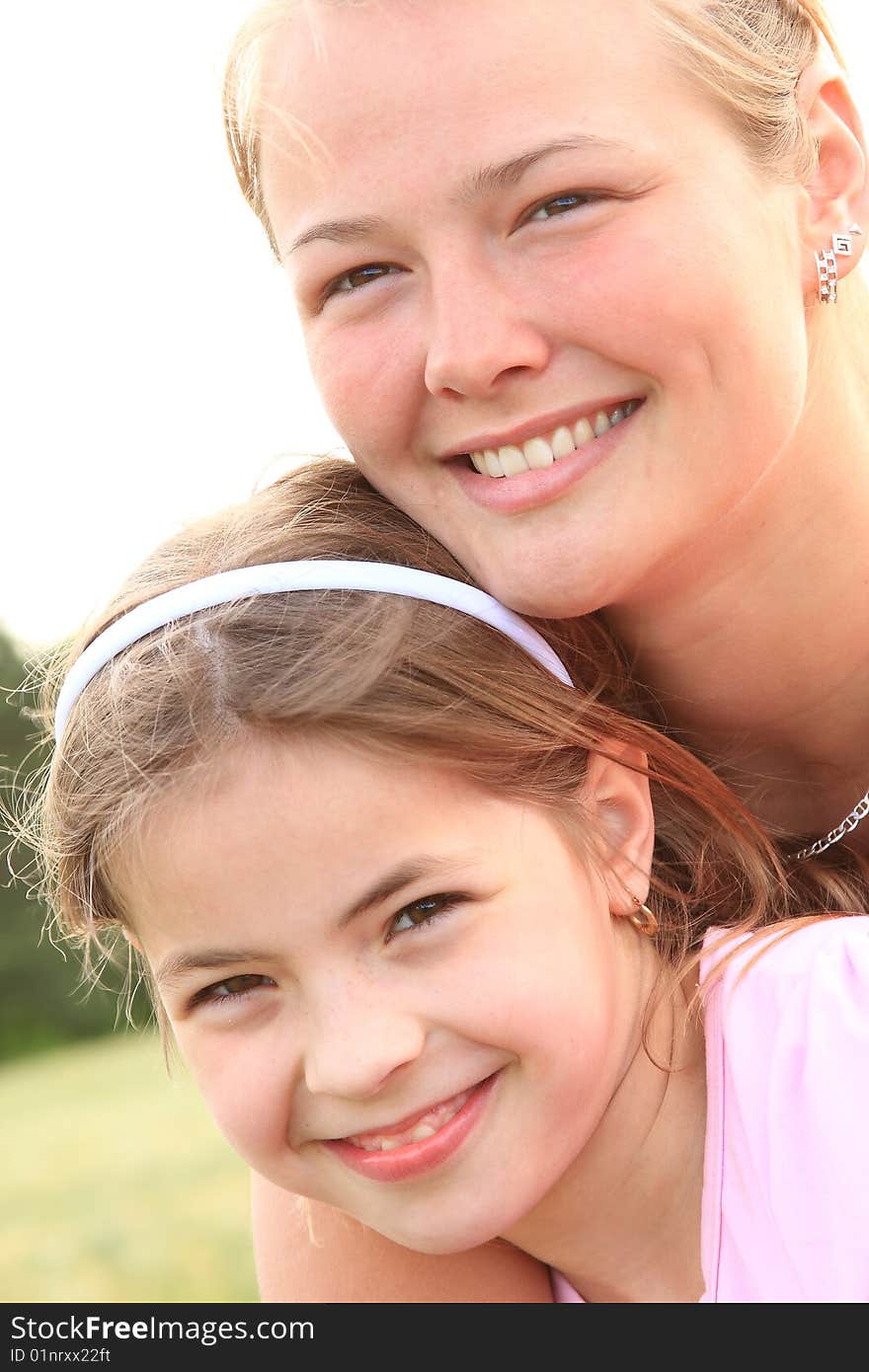 Beautiful, young sisters enjoy life in front of the camera