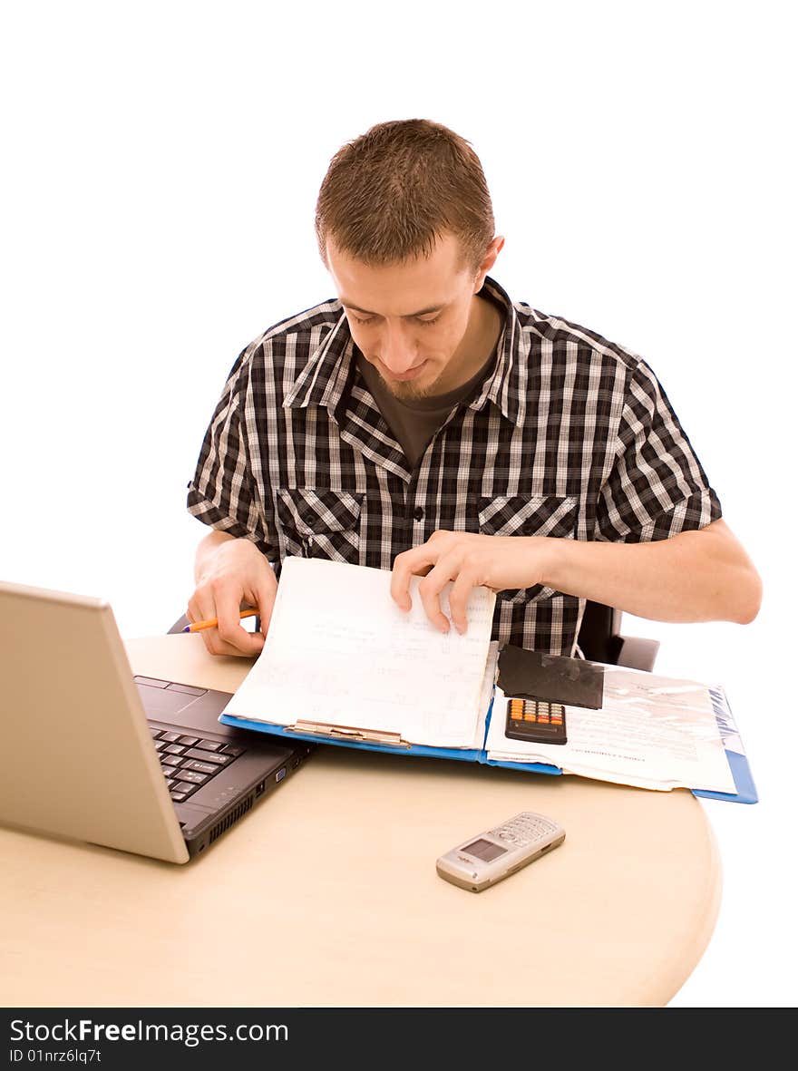 Man with phone working in office