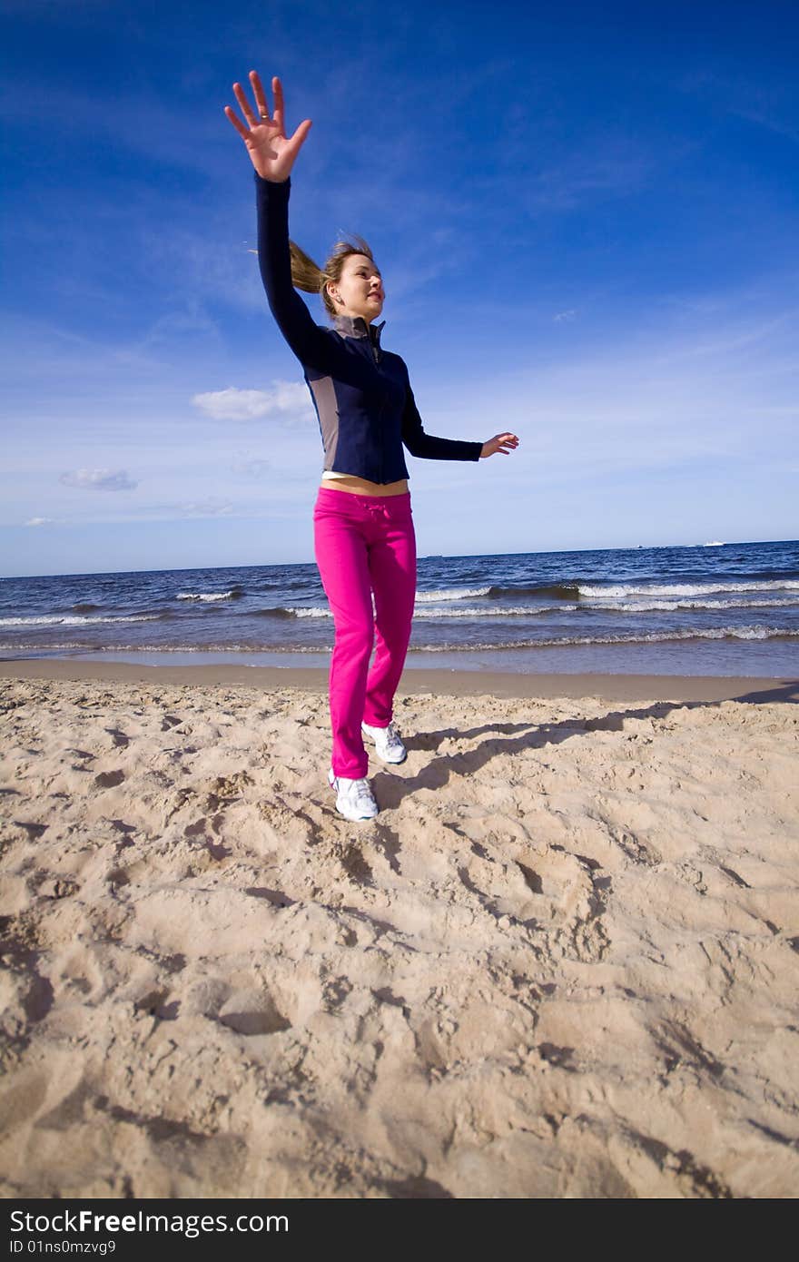 Active woman running on the beach. Active woman running on the beach