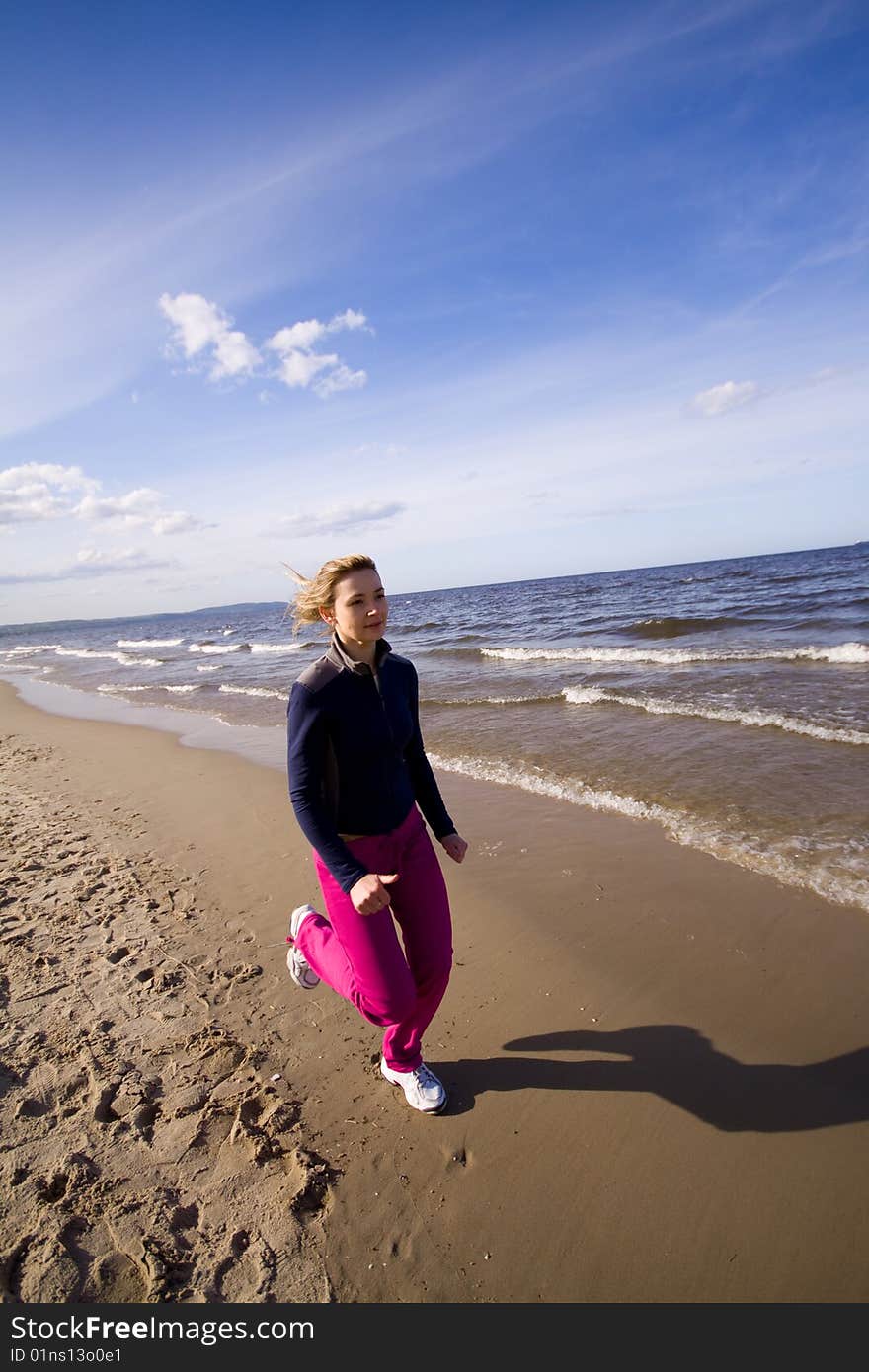 Active woman on the beach