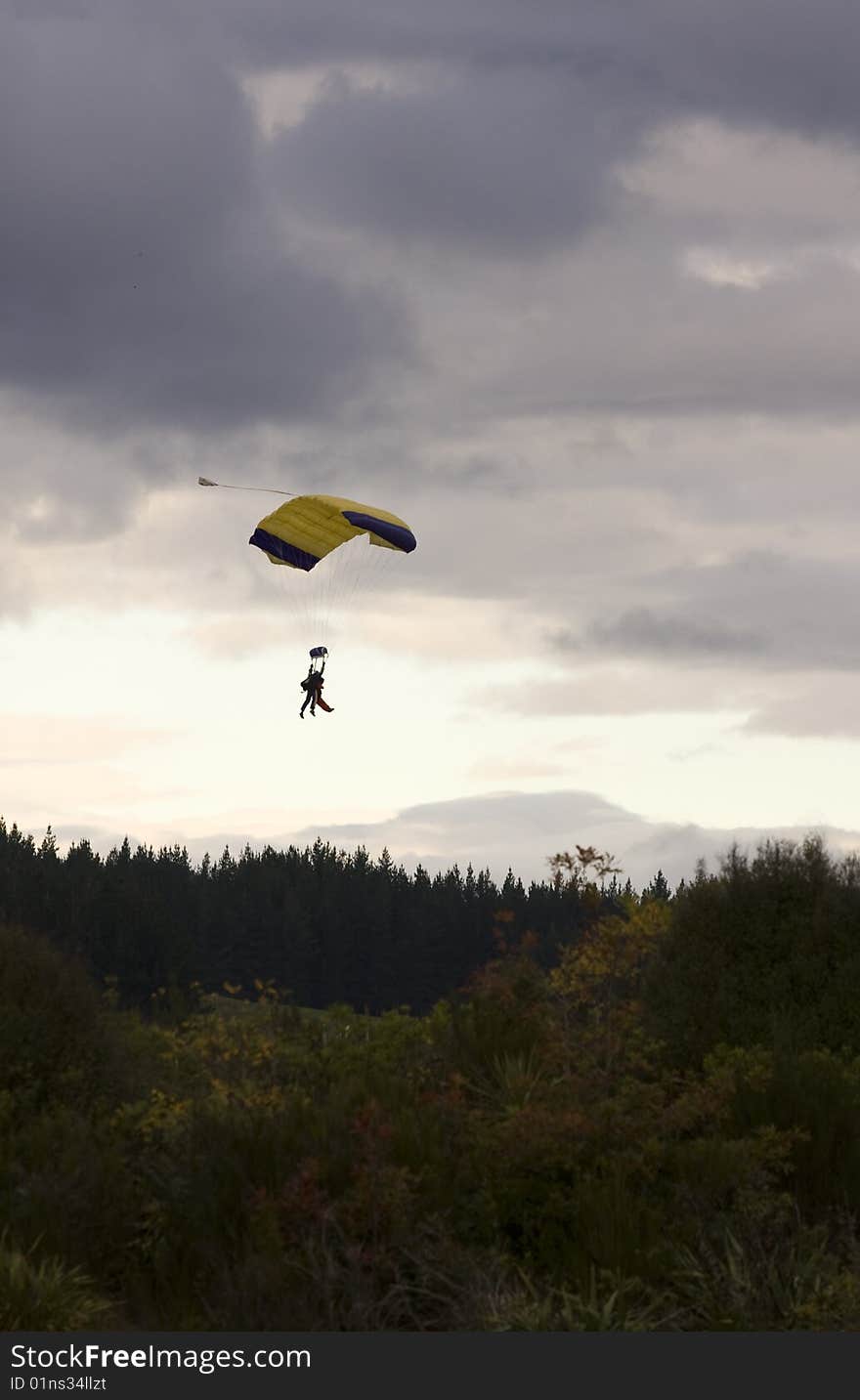 Tandem Paragliders Descending