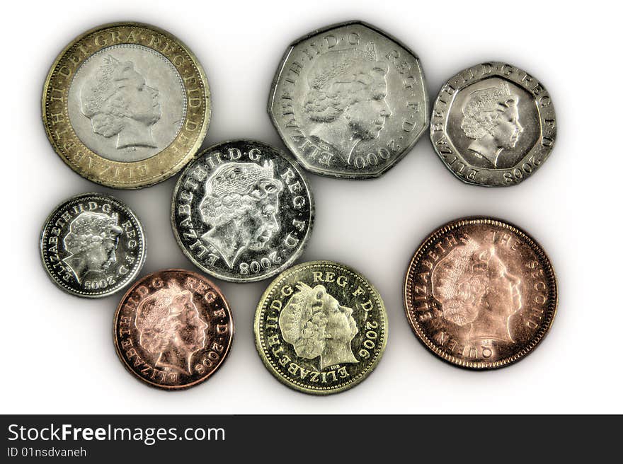 Pound coins on a white background