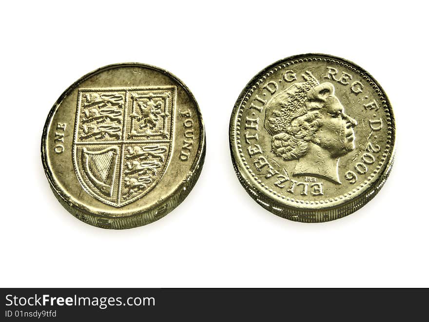 Pound coins on a white background