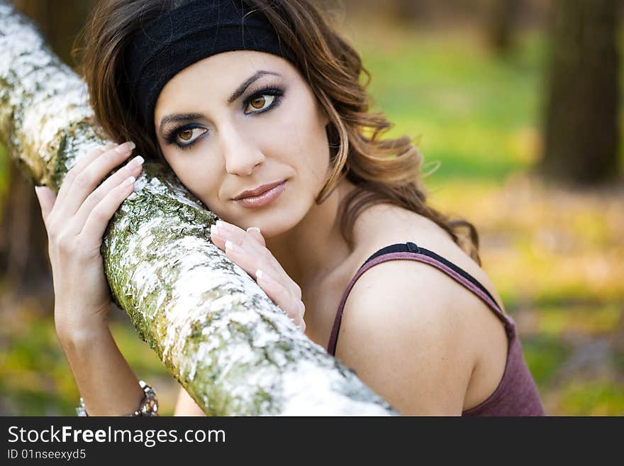 Beautiful girl in a birchwood