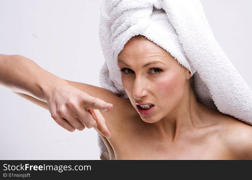 Frustrated house wife wearing white towel. Frustrated house wife wearing white towel