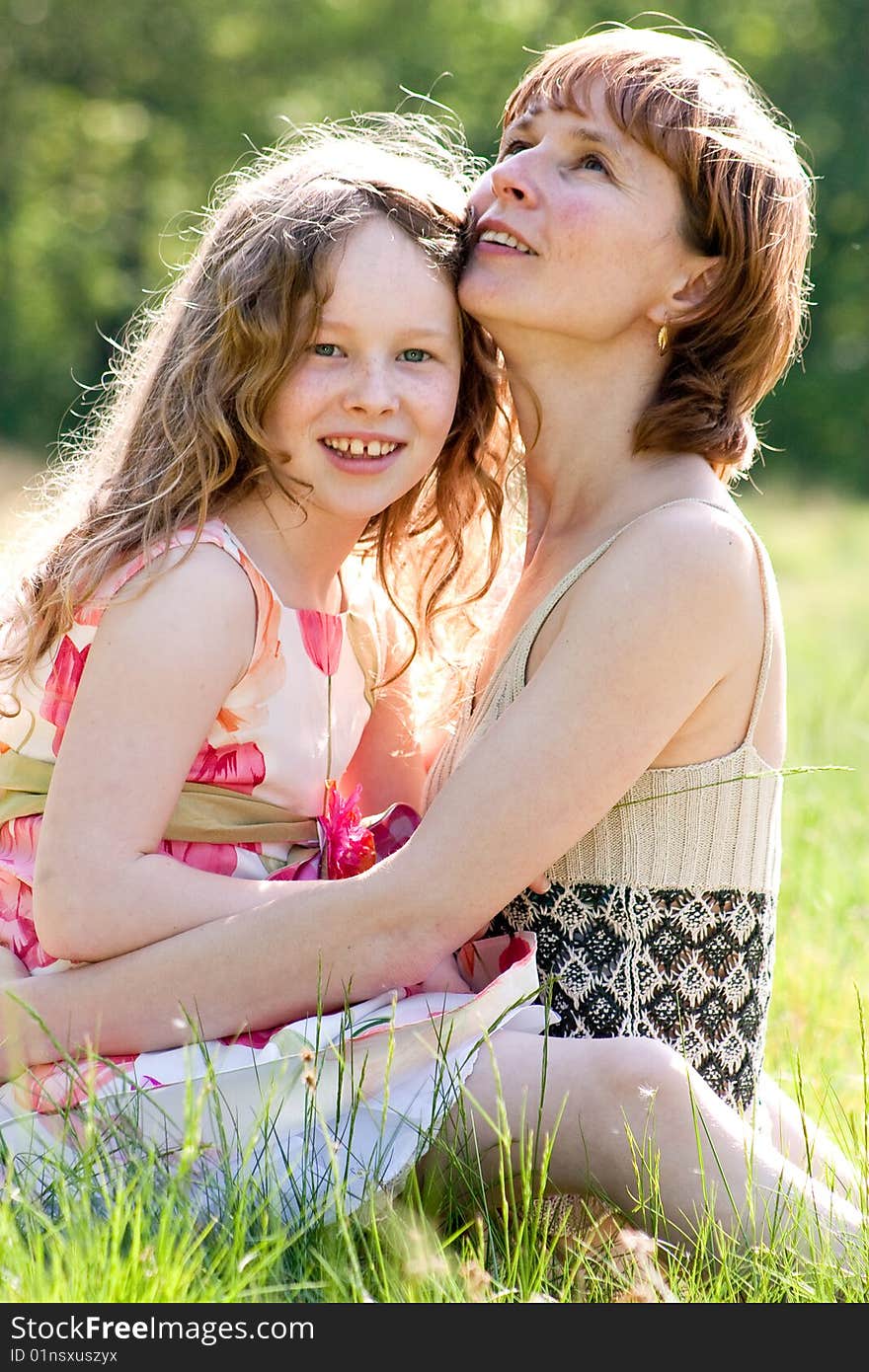 Mother and daughter have a happy time together. Mother and daughter have a happy time together