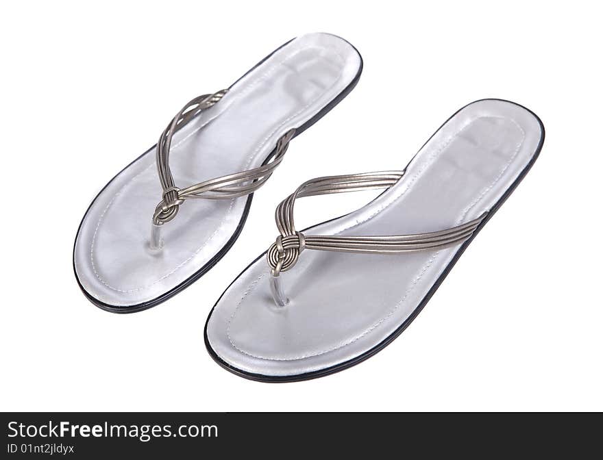 Silver thongs on white background