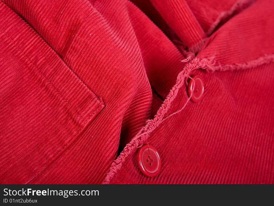 Pocket and button on red corduroy