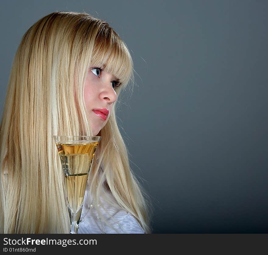 The sad girl with a drink glass. The sad girl with a drink glass