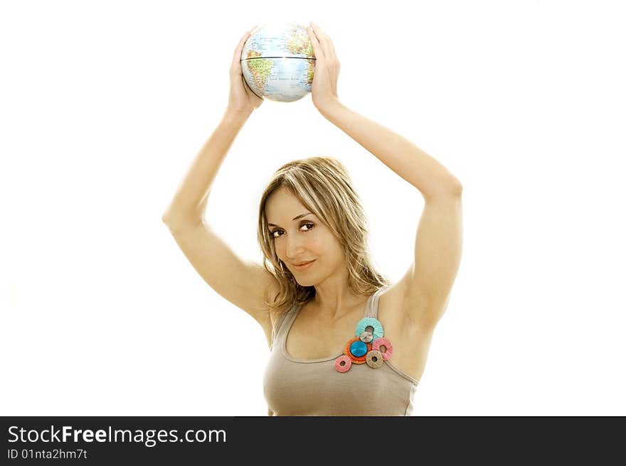 Young woman holding a small globe in her hand. Young woman holding a small globe in her hand.