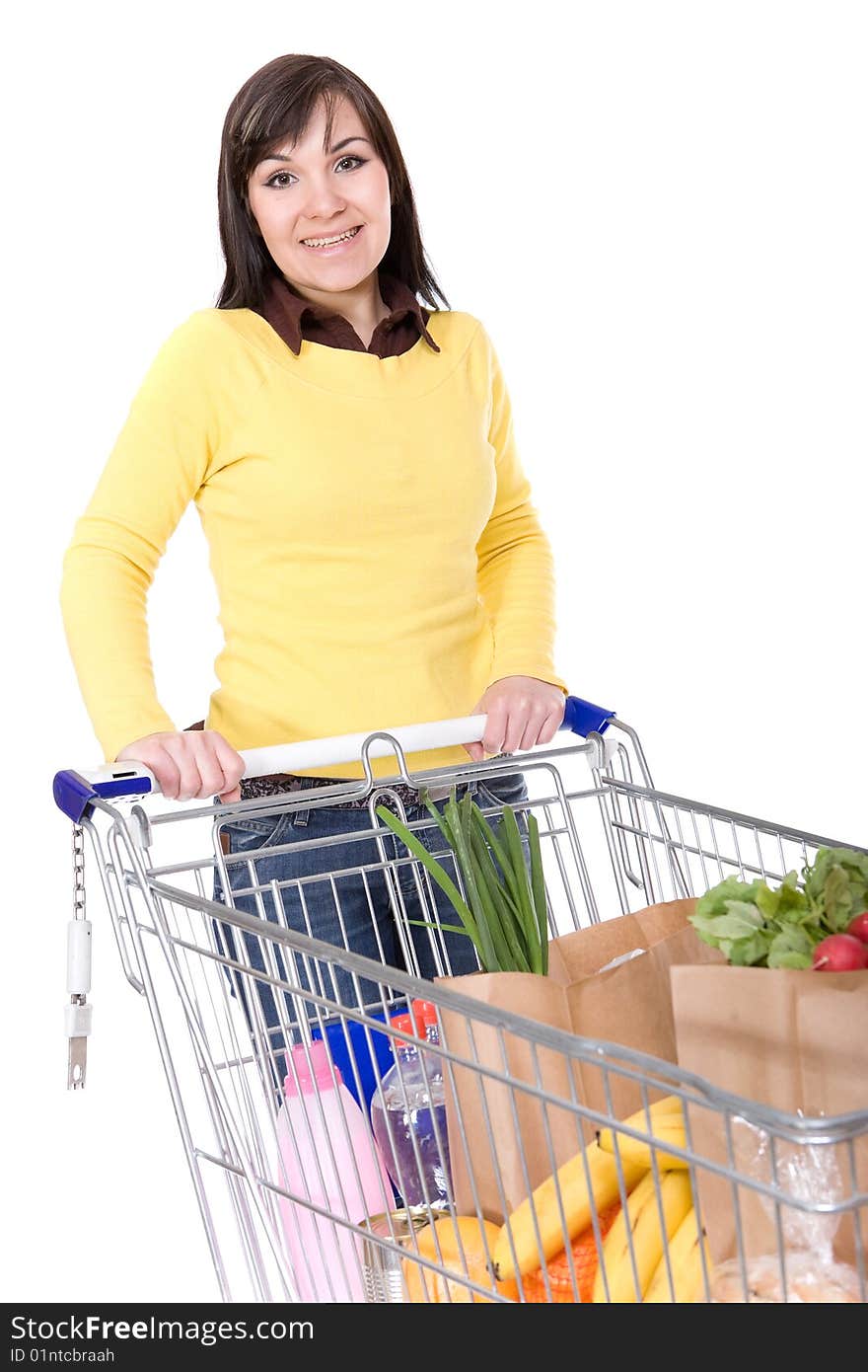 Brunette woman with shopping cart. over white background