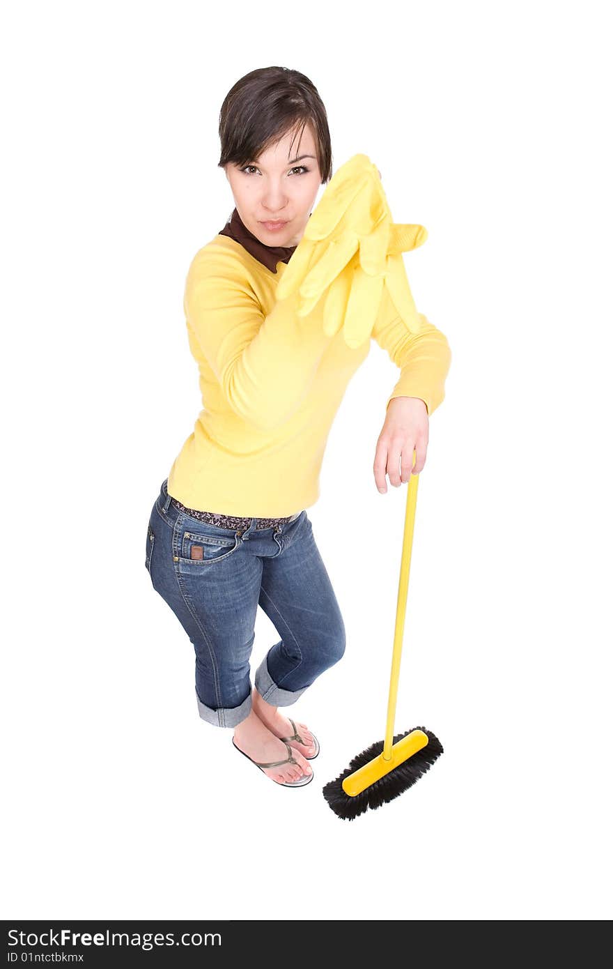 Attractive brunette woman doing housework. over white background. Attractive brunette woman doing housework. over white background