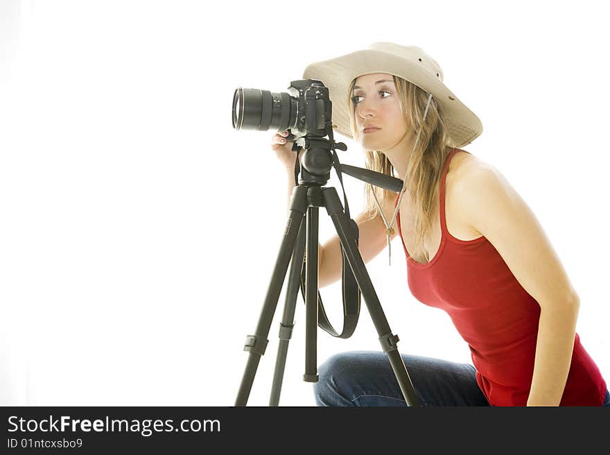 Sexy young photographer taking pictures