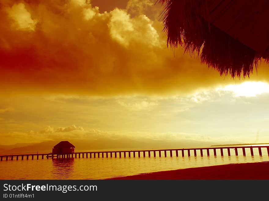 A picture of a cottage at the beach. A picture of a cottage at the beach