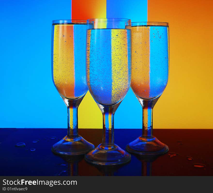 Still life of three glasses, game lines and colors.