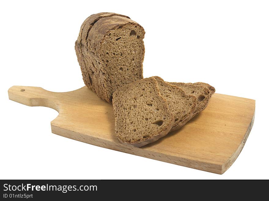 Dark bread on chopping board isolated on white