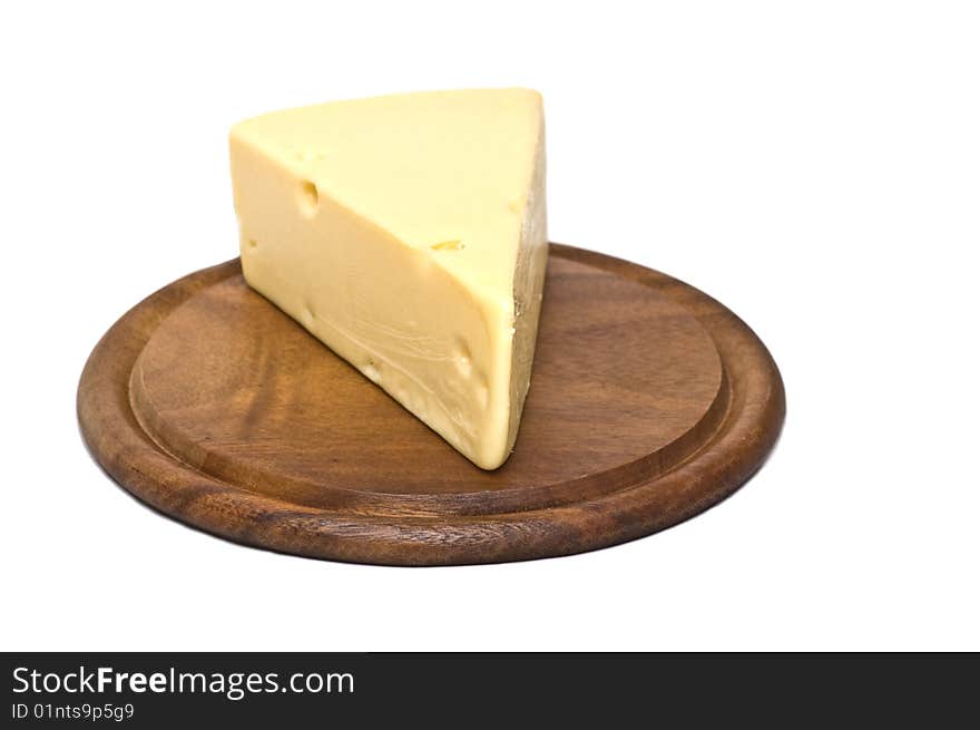 Cheese on wooden board