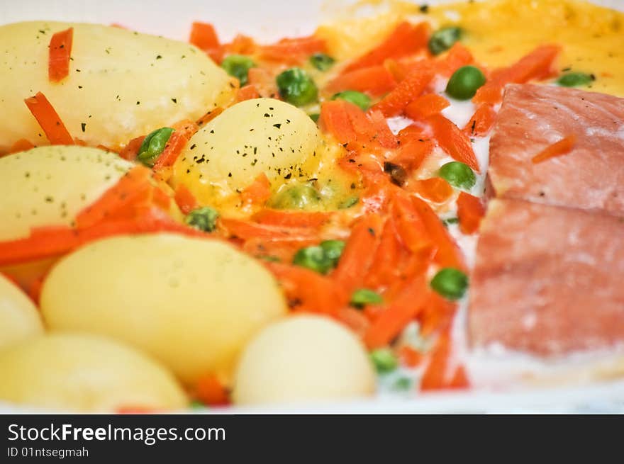 Luxurious potatoes and salmon meal close-up. Luxurious potatoes and salmon meal close-up