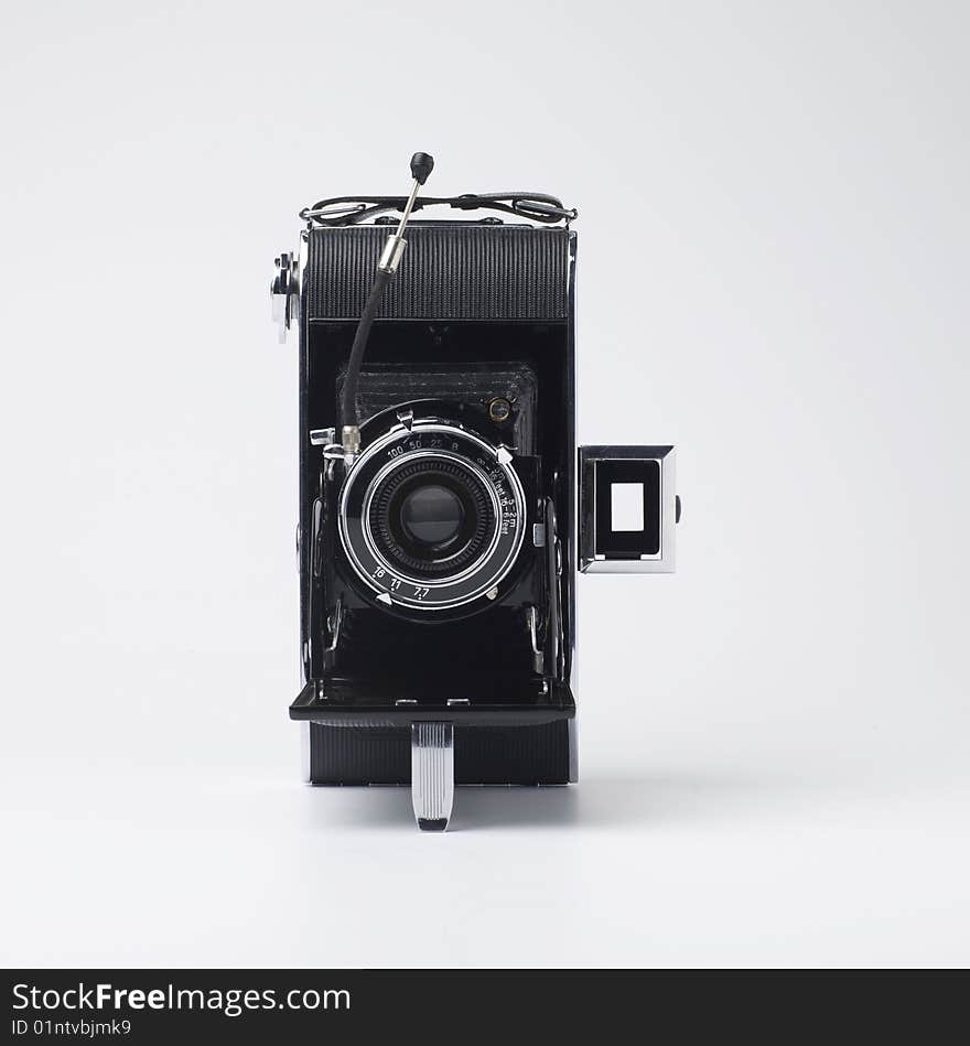 Old camera isolated on white background. Old camera isolated on white background