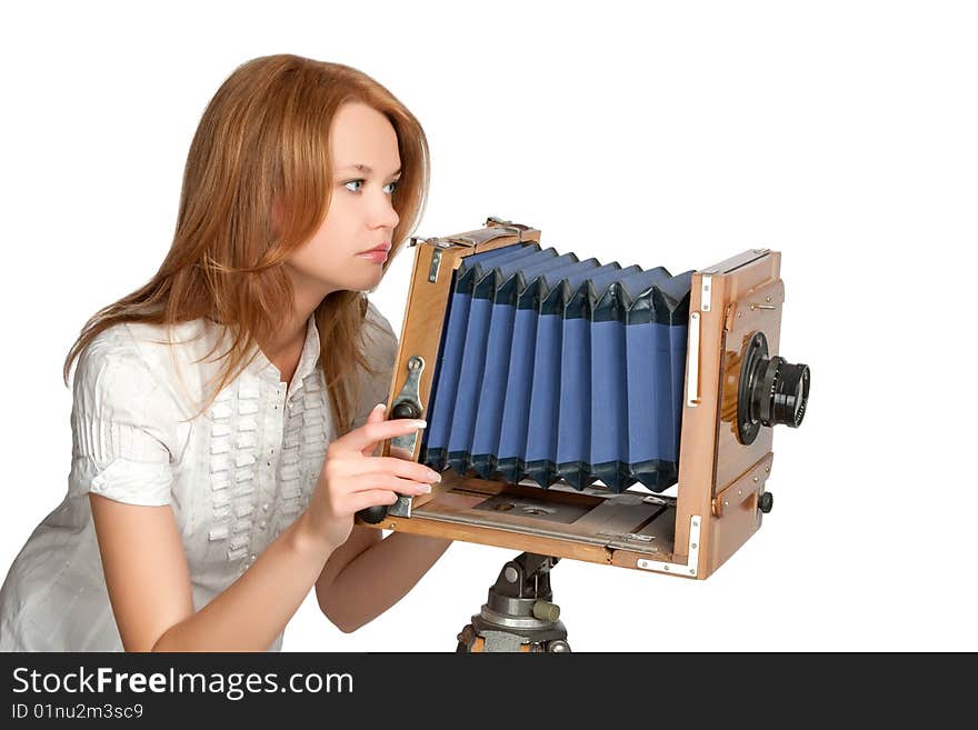 Woman shooting photos with vintage camera  isolated over white