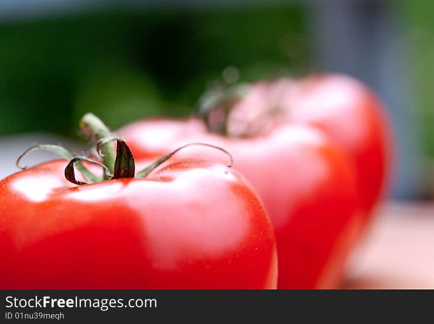 Ripe Beef Tomatoes On The Wooden Background