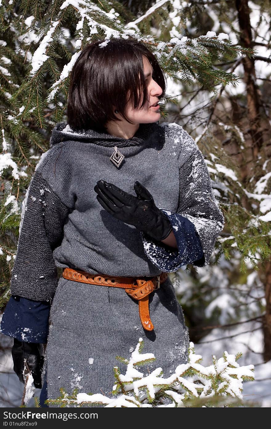 Girl in gray dress and snow tree. Girl in gray dress and snow tree