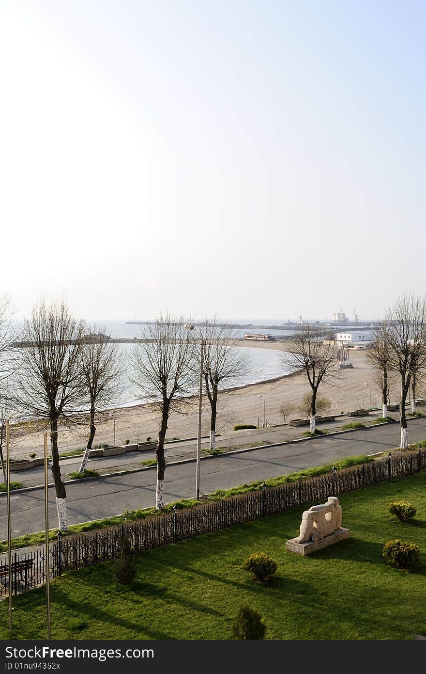 White statue looking at sea