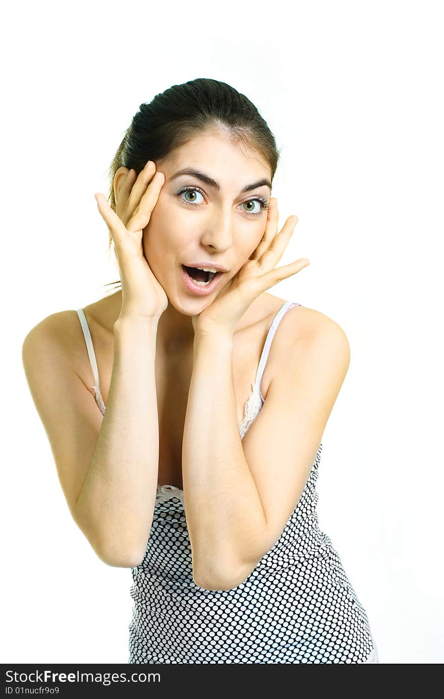 Portrait of a beautiful young surprised woman closing her face with hands. Portrait of a beautiful young surprised woman closing her face with hands