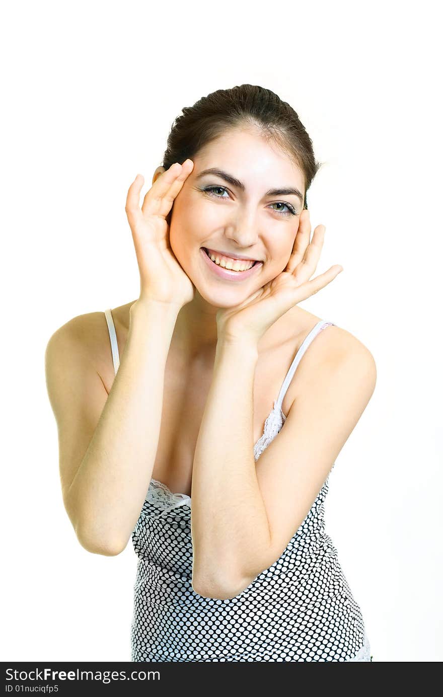 Portrait of a beautiful young surprised woman closing her face with hands. Portrait of a beautiful young surprised woman closing her face with hands