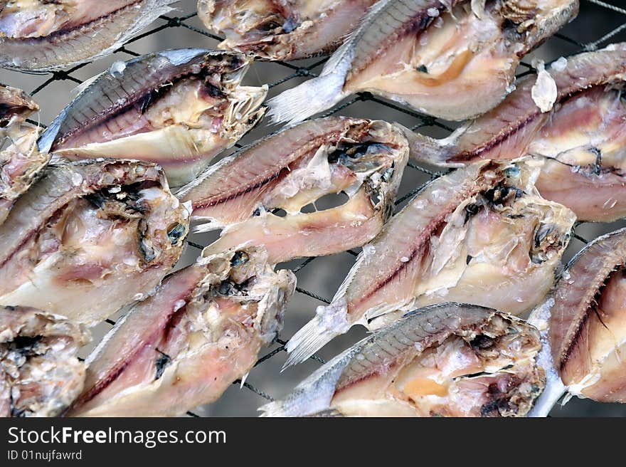 An image of sun dried salted fish. An image of sun dried salted fish