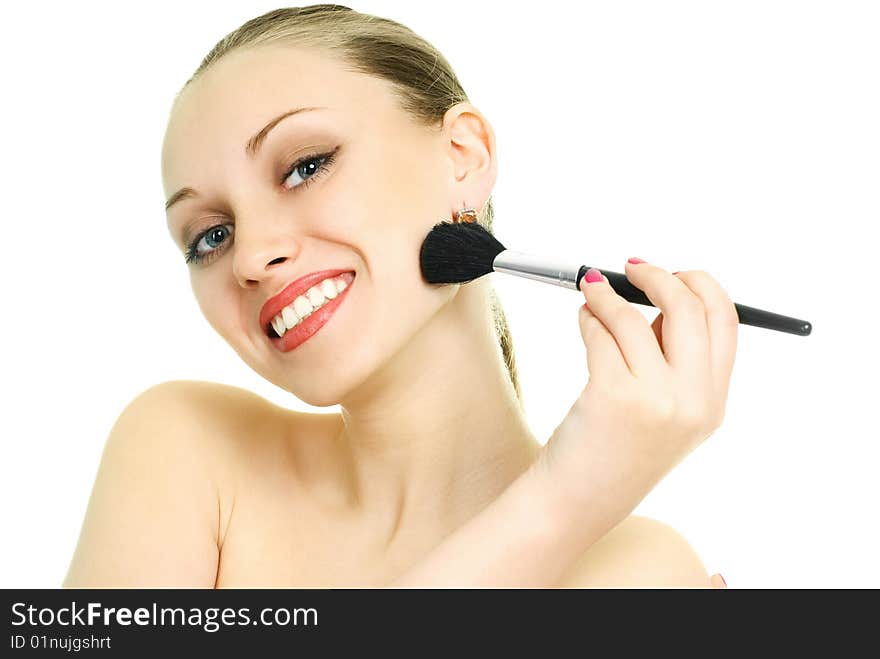 Pretty woman applying makeup