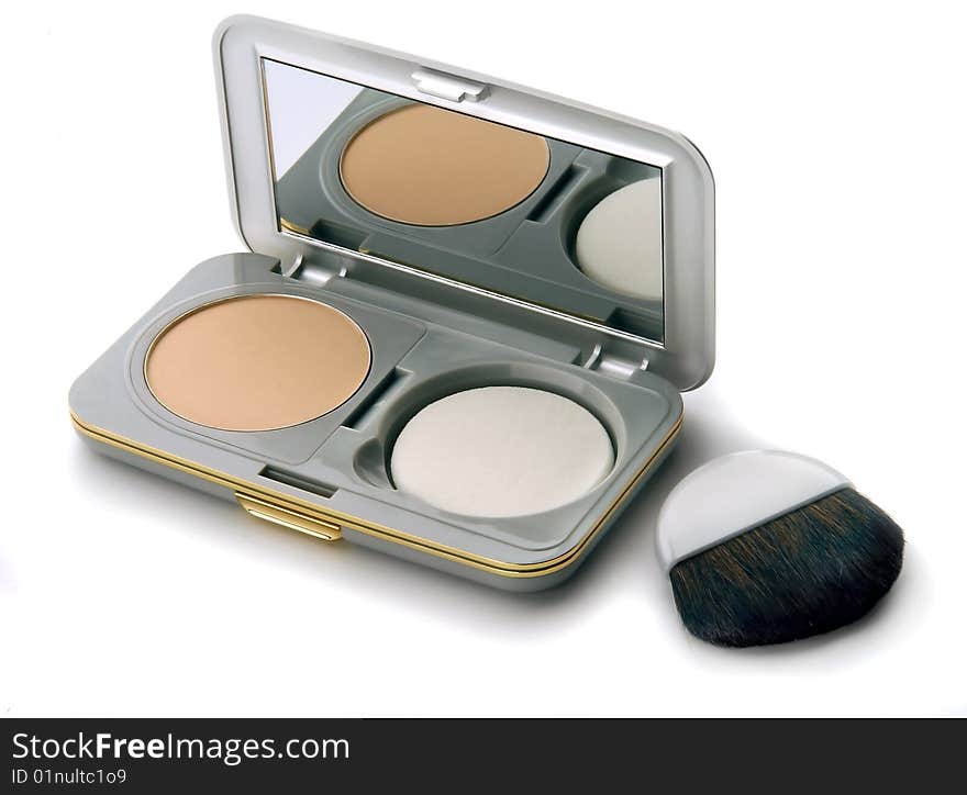 Makeup set: powder, brush, mirror, on isolated white background