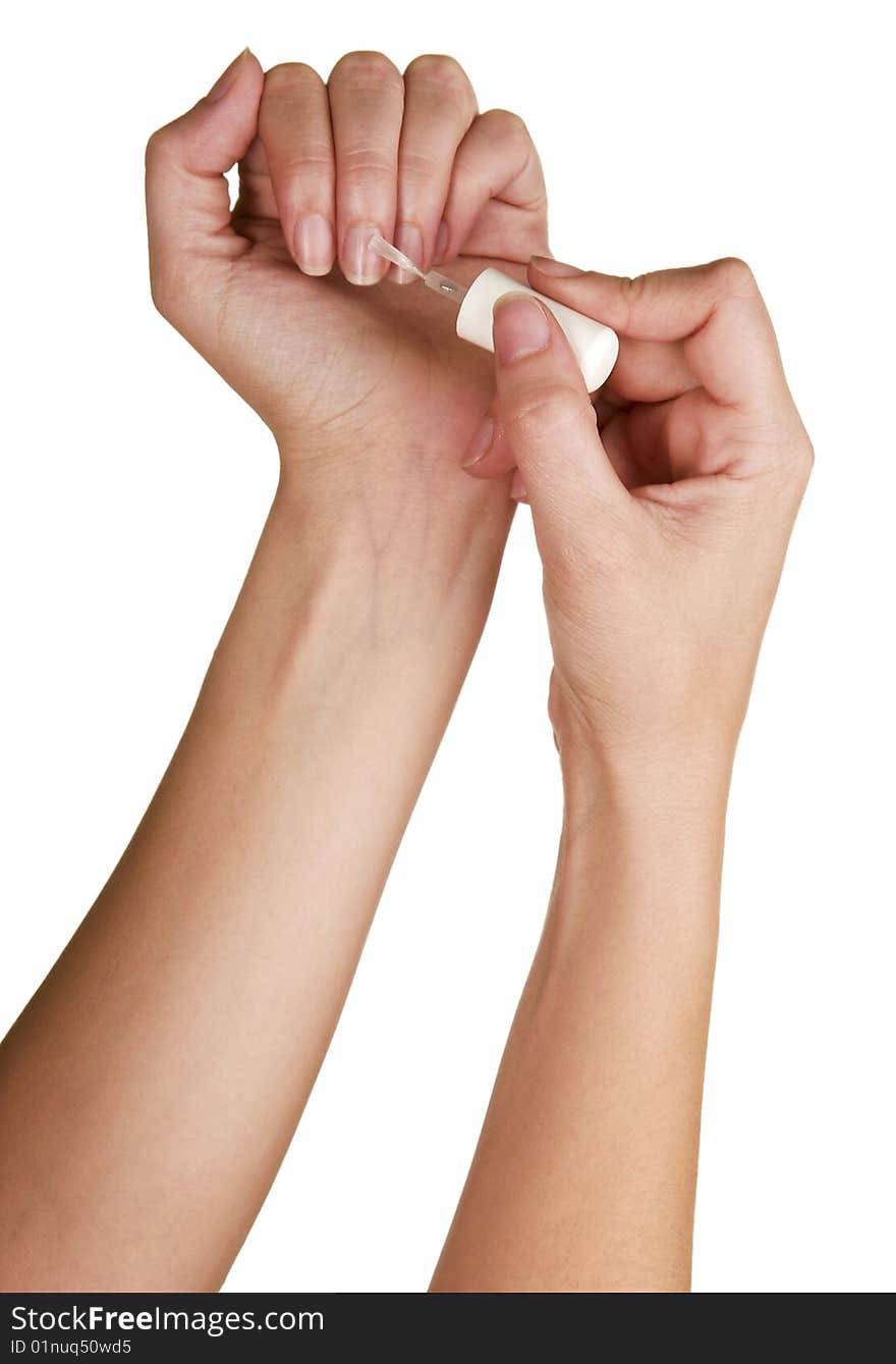 Woman's beautiful hands photographed on white background.