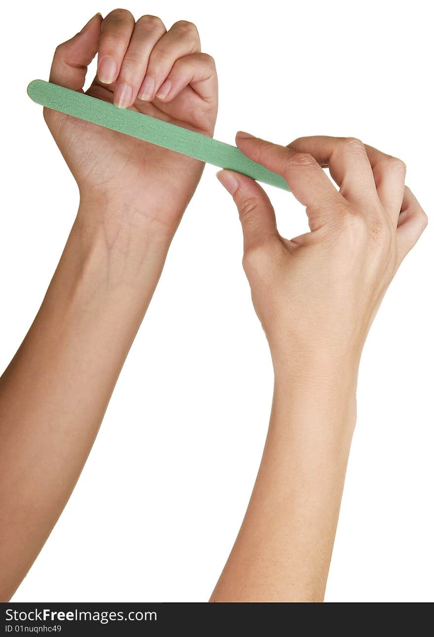 Woman's beautiful hands photographed on white background.