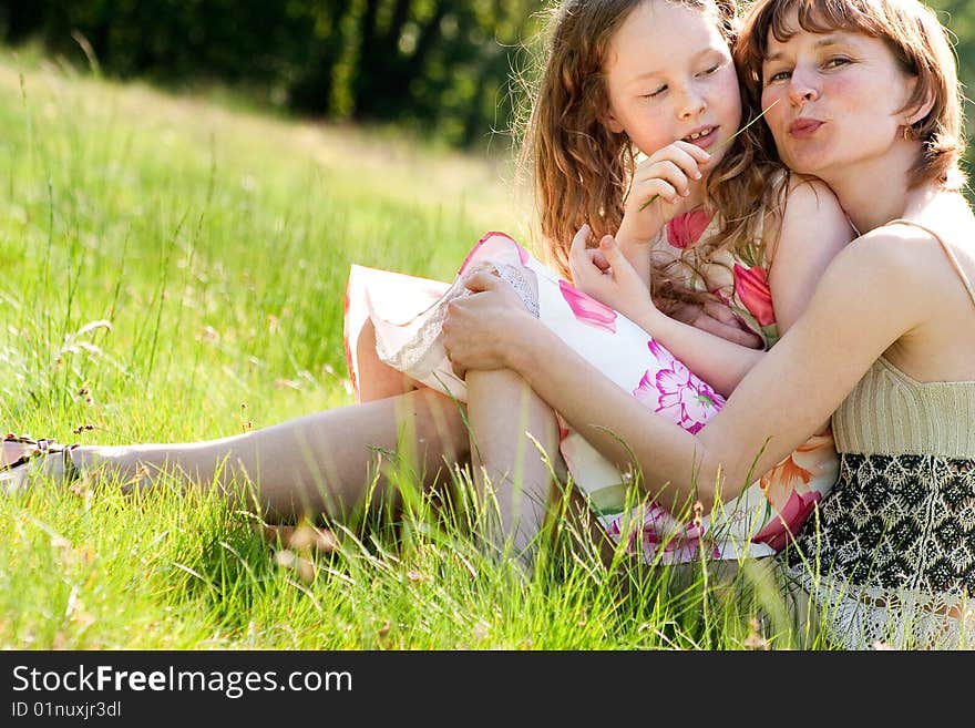 Mother and daughter have a happy time together. Mother and daughter have a happy time together