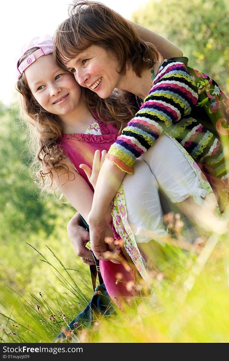 Mother And Daugther In The Spring